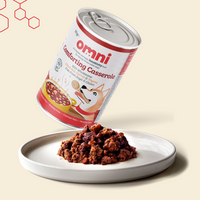 Can of Omni Comforting Casserole pet food on a beige background