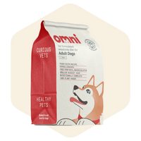 Dog food packaging with 'omni' branding on a beige background