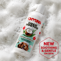Omni Coco Soothe dog shampoo bottle with coconut illustration and text on a foamy background