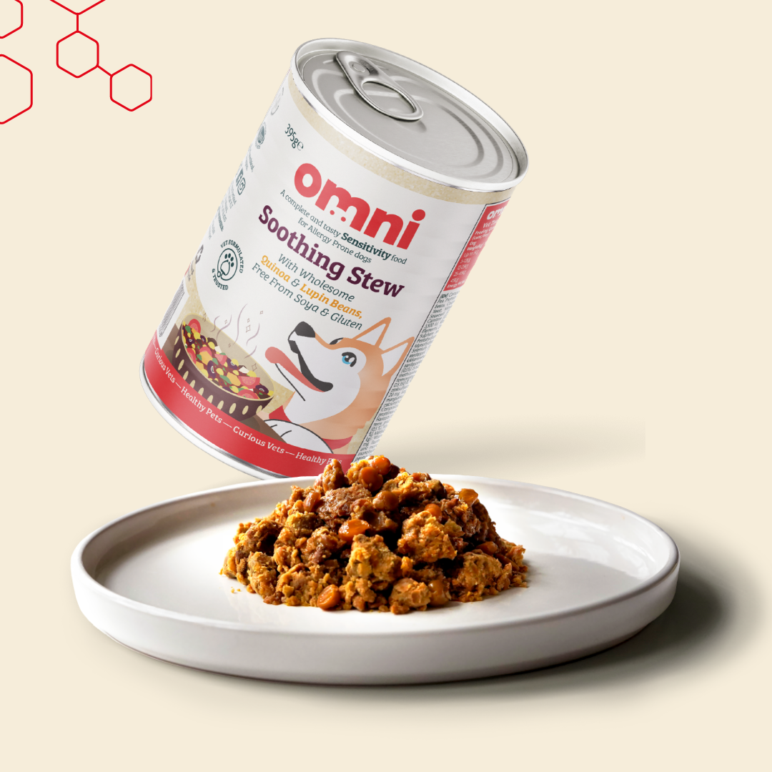 Can of Omni Soothing Stew with a scoop of the stew on a plate against a beige background