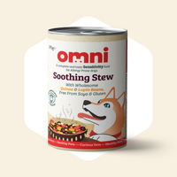 Can of Omni Soothing Stew dog food on a beige background